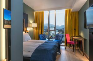 Postel nebo postele na pokoji v ubytování Thon Hotel Lofoten