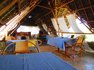 A restaurant or other place to eat at Zeru Zeru Eco Local Wild Lodge