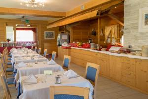 Restaurace v ubytování Alpine Mugon Hotel