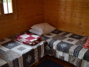 Postel nebo postele na pokoji v ubytování Camping Männisalu
