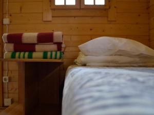 Postel nebo postele na pokoji v ubytování Camping Männisalu