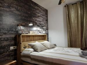 A bed or beds in a room at Apartment Beach Front Canet