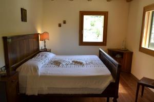 Postel nebo postele na pokoji v ubytování Casale La Rocchetta
