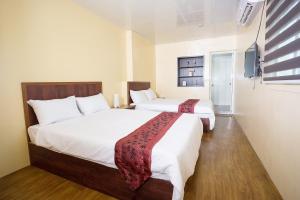 Ліжко або ліжка в номері Babian Bed and Breakfast