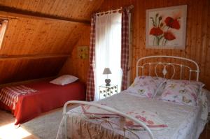 Postel nebo postele na pokoji v ubytování Chambres d'hotes du creulet