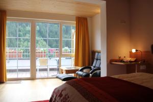 Postel nebo postele na pokoji v ubytování Boutiquehotel Grandau