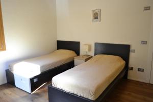 Postel nebo postele na pokoji v ubytování Casale La Rocchetta