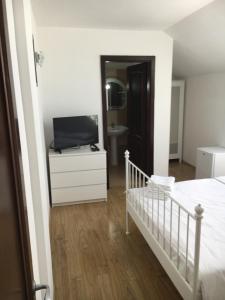 Postel nebo postele na pokoji v ubytování Vila Ann