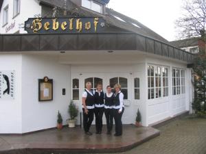 a group of three women standing in front of a building at Golfhotel Hebelhof in Bad Bellingen