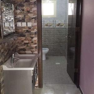 Kúpeľňa v ubytovaní Lahzet Ghoroob Resort