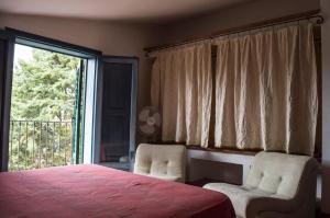 Katil atau katil-katil dalam bilik di Casa Fondachello