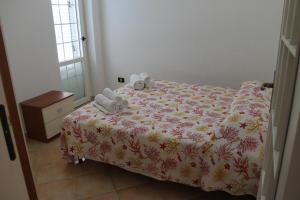 Säng eller sängar i ett rum på Maracaibo