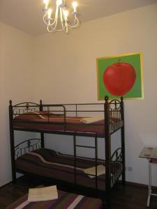 A bed or beds in a room at Hostel Raiduzhny
