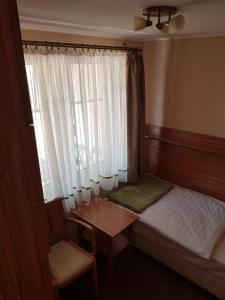 Łóżko lub łóżka w pokoju w obiekcie Villa Nina