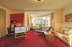 Telewizja i/lub zestaw kina domowego w obiekcie Hotel Schneeberghof