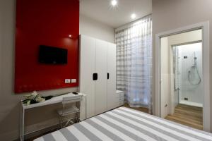 Postel nebo postele na pokoji v ubytování Hotel Aurea