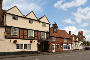 a building on the side of a street at White Hart Hotel in Dorchester on Thames