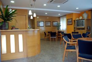 TV a/nebo společenská místnost v ubytování Hotel De Rei