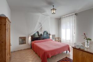 Postel nebo postele na pokoji v ubytování Agriturismo Maso Lizzone