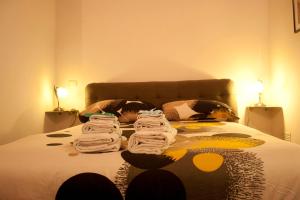 A bed or beds in a room at Le Scalette