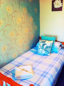 Postel nebo postele na pokoji v ubytování Seahaven House
