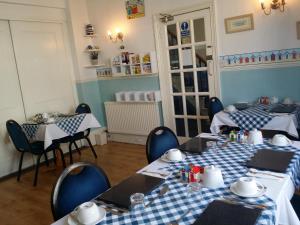 A restaurant or other place to eat at The Beach House 