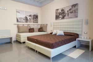 A bed or beds in a room at VIA NALDINI n 61