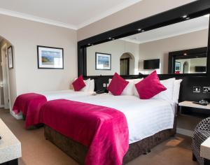 Cama ou camas em um quarto em Ashling Hotel Dublin