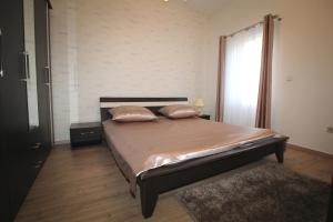 Posteľ alebo postele v izbe v ubytovaní Apartment J&I
