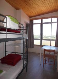 Postel nebo postele na pokoji v ubytování O Cabalo Verde + 15 fotografií