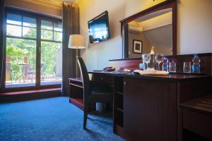 TV a/nebo společenská místnost v ubytování Hotel Galicja Wellness & SPA