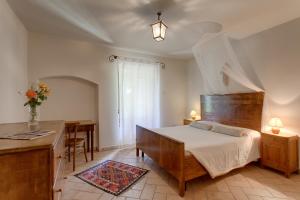 Postel nebo postele na pokoji v ubytování Agriturismo Maso Lizzone