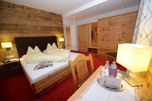 Posteľ alebo postele v izbe v ubytovaní Hotel Zimmerbräu