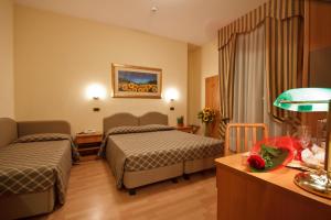 Posezení v ubytování Hotel Villa Luca + 37 fotografií