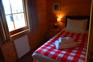 Postel nebo postele na pokoji v ubytování Saplinbrae Hotel and Lodges