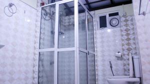 Koupelna v ubytování Anura Home Stay + 37 fotografií