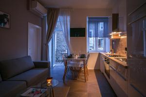 Kuchyňa alebo kuchynka v ubytovaní Apartments Bella Fiume