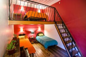 Giường trong phòng chung tại Dragonfly Hostels Cusco