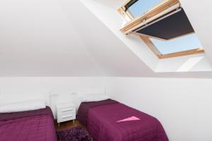 Postel nebo postele na pokoji v ubytování Apartman Marica