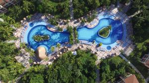 an overhead view of a swimming pool at a resort at Bahia Principe Grand Coba - All Inclusive in Akumal