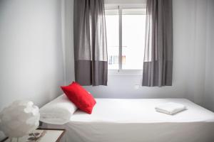 Posteľ alebo postele v izbe v ubytovaní Apartamento Buhaira