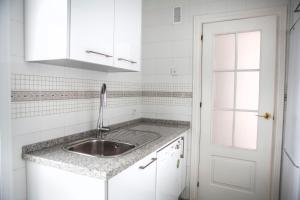 Kuchyňa alebo kuchynka v ubytovaní Apartamento Buhaira
