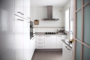 Kuchyňa alebo kuchynka v ubytovaní Apartamento Buhaira