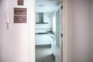 Kuchyňa alebo kuchynka v ubytovaní Apartamento Buhaira