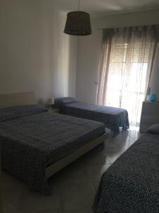Postel nebo postele na pokoji v ubytování B&B La Barcaccia