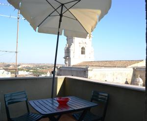 Ein Balkon oder eine Terrasse in der Unterkunft Culla del Barocco