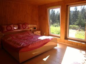 Postel nebo postele na pokoji v ubytování Eco Resort Nad Karpatamy + 37 fotografií