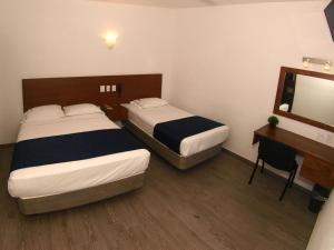 Postel nebo postele na pokoji v ubytování Hotel Star