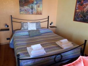 Posteľ alebo postele v izbe v ubytovaní Casa Madonnina