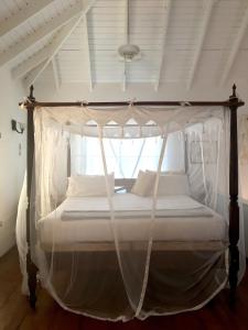 Voodi või voodid majutusasutuse Aloe Villa toas